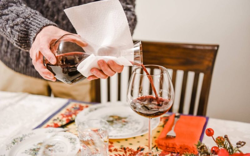 a-man-pours-red-wine-into-a-wine-glass-prior-to-di-2024-11-27-15-45-54-utc_1280px